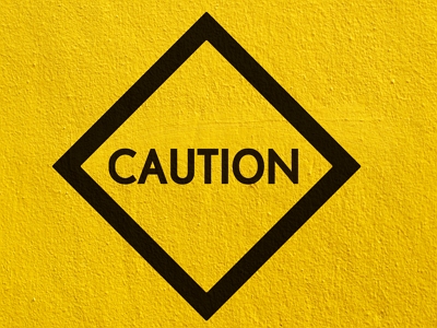 yellow caution sign illustrating Common Tenant Screening Mistakes Landlords Make